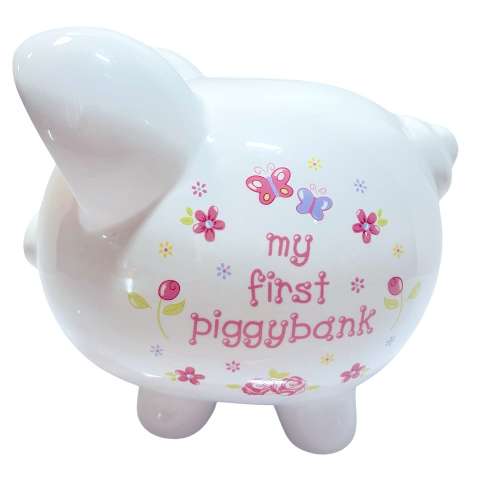 White Ceramic Piggy Bank with Pink and Purple Floral and Butterfly Designs.